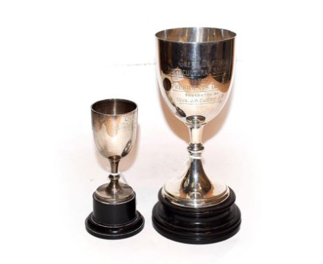 A George V silver cup and an Elizabeth II silver cup, The First by Edward Barnard and Sons Ltd., Birmingham, 1921, The Second