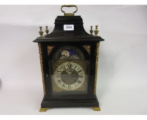 Contemporary ebonised bracket clock, the caddy moulded case enclosing a silvered brass dial signed John Johnson, London with 