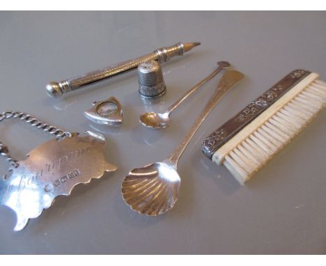 Silver decanter label together with a quantity of other small silver items