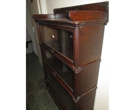 Oak Globe Wernicke three section glazed bookcase with a galleried top