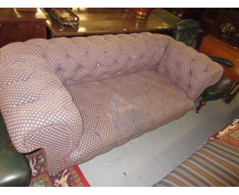 Victorian deep button upholstered Chesterfield type two seat sofa with double drop ends and low turned supports