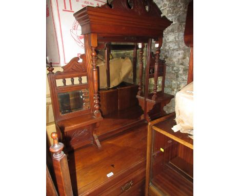 Late Victorian walnut sideboard with a mirror inset shelf back above two drawers and two carved panelled doors