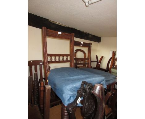 Set of ten late Victorian walnut dining chairs with carved and spindle rail backs above carpet covered stuffover seats and tu