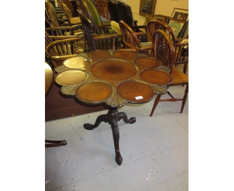 19th Century mahogany supper table in 18th Century style, the shaped carved multiple dish top above a turned and carved colum