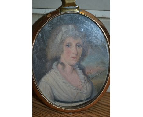 19th Century portrait miniature of a lady in a gilt metal frame