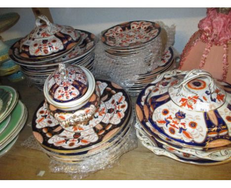 19th Century / Ashworth, Imari pattern dinner service decorated in iron red, blue and gilt