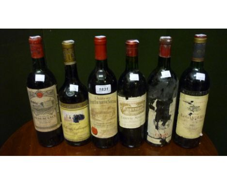Similar quantity of various vintage French red wines