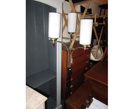 1950's Three branch black and gold finished standard lamp with opaque glass shades