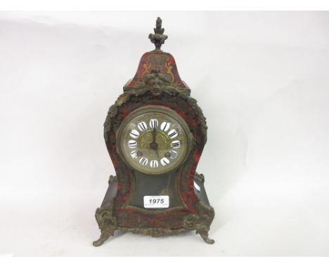 19th Century French buhl mantel clock with a gilded dial, ceramic Roman numerals and a two train movement inscribed Mougin (f