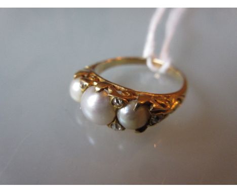 Edwardian gold pearl and diamond set ring