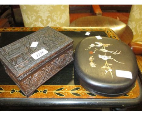 Chinese carved hardwood rectangular box with hinged cover and a Chinese mother of pearl inlaid inkstand in a fitted box