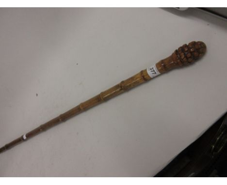 Late 19th or early 20th Century Malacca hand stick, the gnurled grip rising to reveal a concealed measure with original spiri