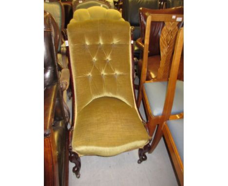 Victorian carved walnut button upholstered nursing chair