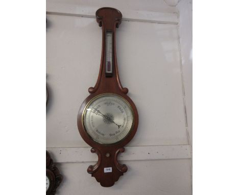 Victorian oak wheel barometer / thermometer with silvered dials
