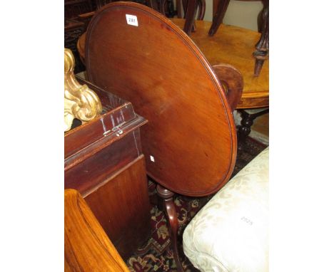 George III circular mahogany tilt top tripod table