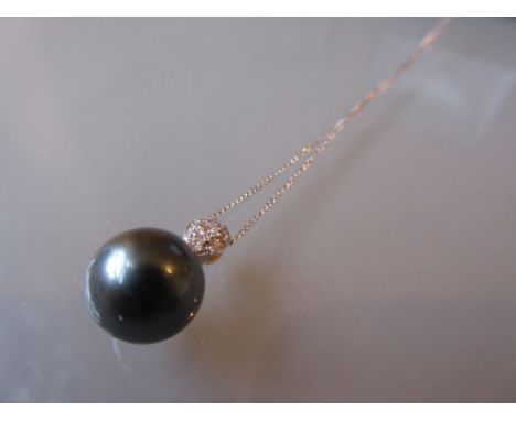 Black cultured pearl and diamond set pendant on chain