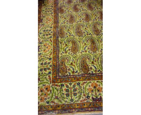 Tabriz carpet with an all-over design of large Boteh on ivory ground with floral borders, 13ft x 10ft approximately