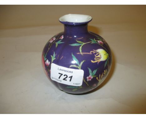 Small 20th Century Chinese porcelain vase decorated with flowers and fruits on a blue ground, seal mark to base, 4ins high