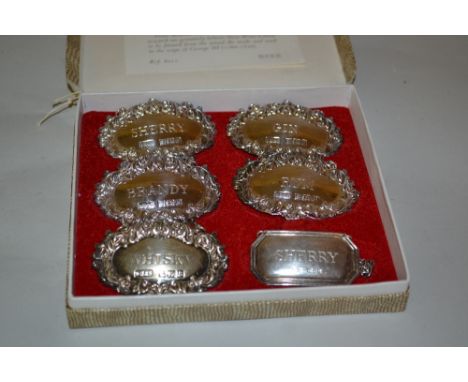 Set of five modern Birmingham silver decanter labels together with one other