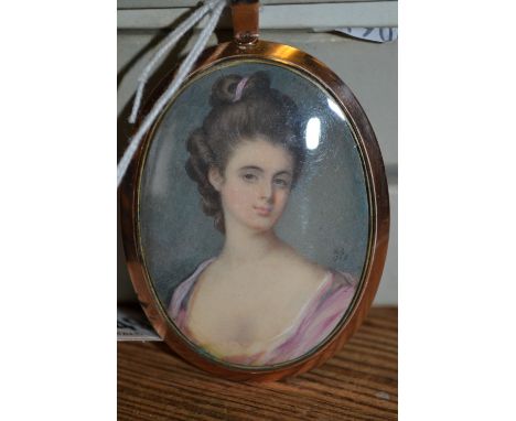 18th Century English school oval miniature watercolour portrait of a lady, signed with initials S.C. and dated 1769, mounted 