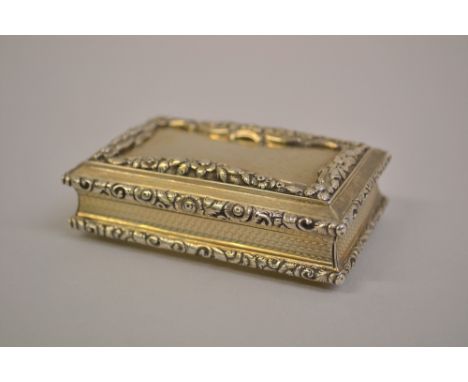 Nathaniel Mills silver gilt rectangular snuff box, having floral cast decoration and waisted body with engine turned decorati