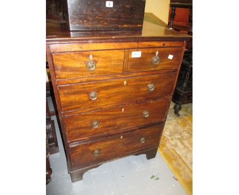 19th Century mahogany dwarf chest of four graduated drawers with brass ring handles on bracket feet
