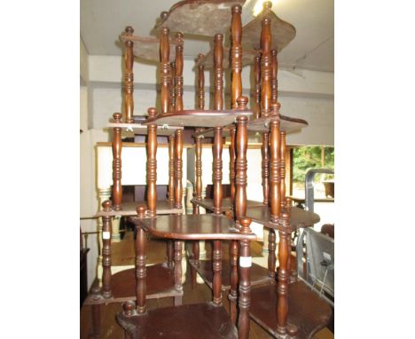 Four reproduction mahogany corner whatnots and a small wall bracket
