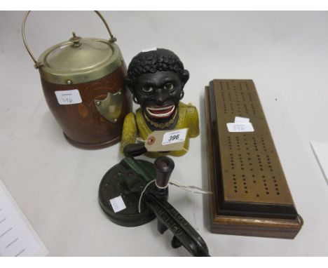 Cast iron money box in the form of a Negro head, a cribbage board, bean slicer and an oak silver plate mounted biscuit barrel