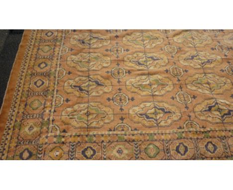 Persian style carpet having rust ground with borders