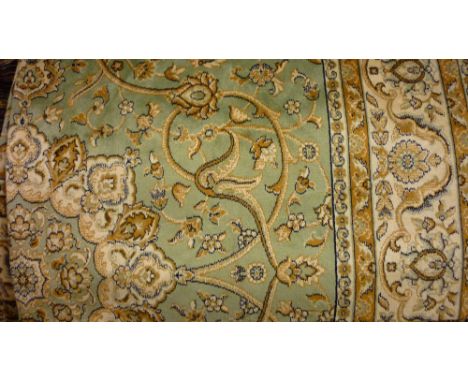 Green ground machine woven Kashan style carpet, 2.3m x 1.6m