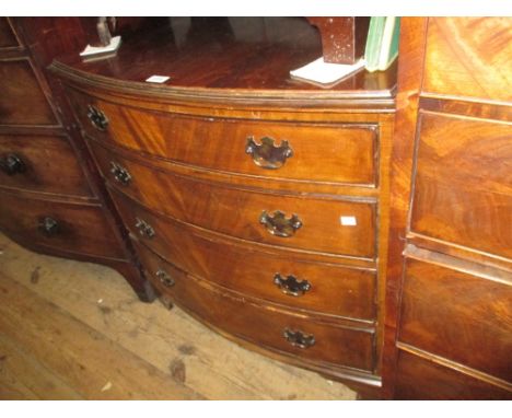 Mid 20th Century mahogany four drawer bow front chest on bracket feet