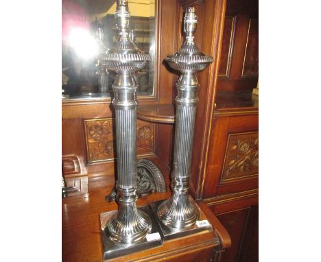 Pair of silver plated column table lamp bases with reeded columns on square bases