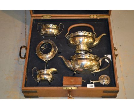 Early 20th Century silver tea service comprising: spirit kettle, teapot, sugar basin and cream jug, hallmarked Chester 1915 a