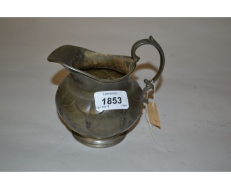 Small 19th Century pewter milk jug, marked R. Broadhead and Co. Sheffield