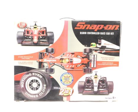 A Snap-On radio controlled race car set, 1:10 scale, boxed.