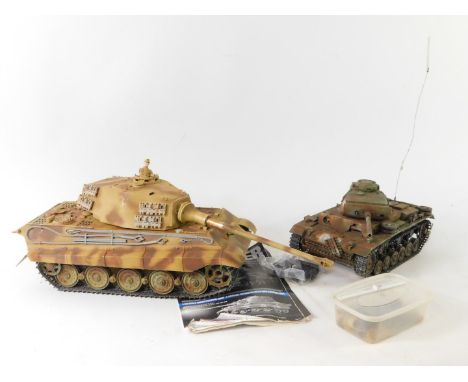 A Panzerkarpfwagen VI 'Konigstiger' radio controlled tank, 1:16 scale, together with another remote control tank, both lackin