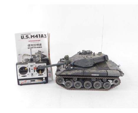 A radio controlled battle tank, modelled as a Walker Bulldog light tank U.S.  M41A3, 1:16 scale, with Sender radio control, a