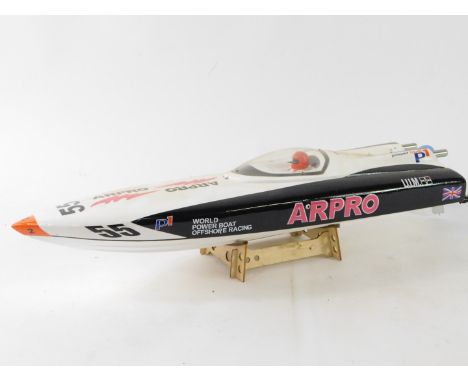 A Dragon Hobby P1 Arpro 700EP Offshore Racing remote control boat, with instruction manual, 17cm H, 70cm L.