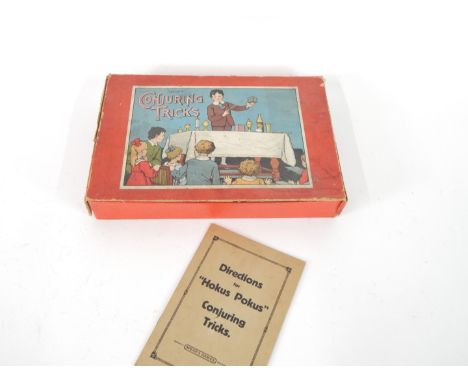 A Spears 'Hocus-Pocus' Conjuring Tricks set, with various tricks, and instruction manual, boxed. (AF)