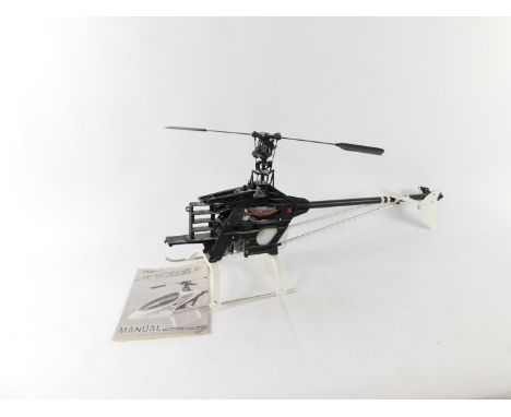 A kit built Thunder Tiger Raptor 30 Class Nitro RC helicopter, with manual, lacking plastic body and remote control. (AF)