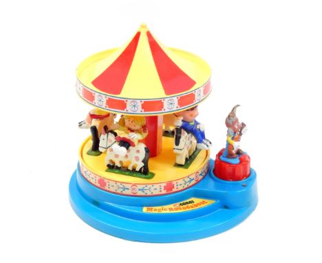 A Corgi Magic Roundabout musical carousel, No 852, with Swiss musical movement, boxed.