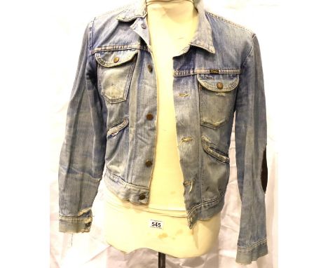 A vintage Wrangler denim jacket in well worn condition, size 38. P&amp;P Group 2 (£18+VAT for the first lot and £3+VAT for su