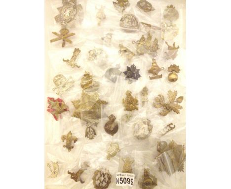 Assorted army cap badges, Infantry Cavalry, Yeomanry and Arms and Service, 200 in total