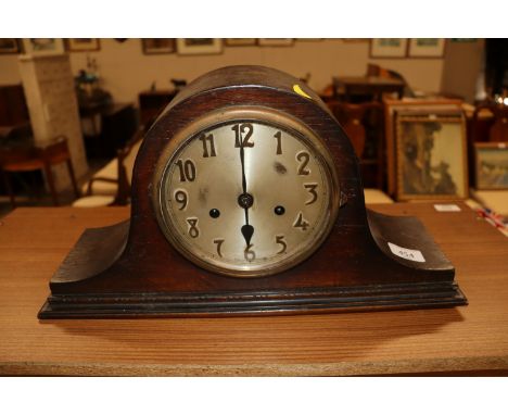 A 1930's oak cased mantel clock