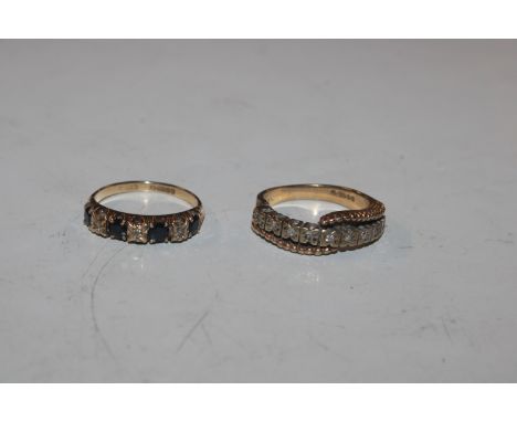 A 9ct gold half eternity ring set with chip diamonds, ring size M, approx. 2gms and a 9ct gold and chip diamond set cross ove