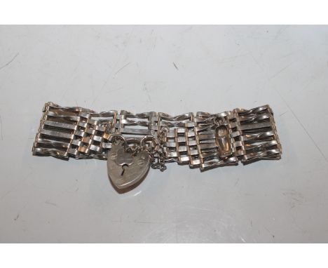 A Hallmarked Sterling silver six bar gate link bracelet with padlock clasp, approx. 22gms