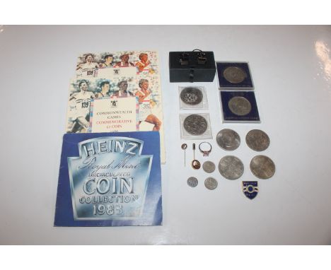 A quantity of various coinage; a pair of cuff-links; a dress ring; badge etc.