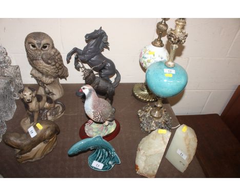 A Border Fine Arts partridge by Russell Willis, A0660; a Poole pottery dolphin ornament; a bronzed study of a stag and a rear