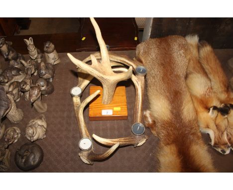 An antler tea light holder 