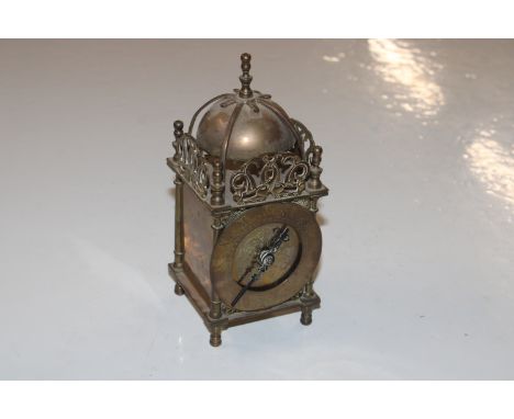 A Smiths brass cased lantern clock
